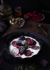 Yogurt with fresh fruit. Yogurt with berries. Healthy breakfast or snack. Prebiotics and antioxidants. Healthy food