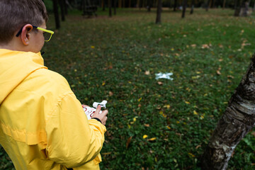 boy flying drone