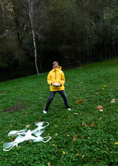 boy flying drone