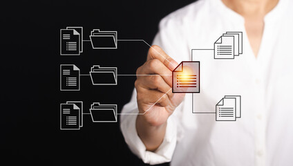 A businesswoman's pressing sign sheets of a document on a virtual screen while standing on a black background. Document management system online. Corporate business technology and security concept