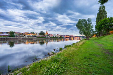 Fototapeta na wymiar Old Town bridge and boulevard in Gorzow Wielkopolski at blue hour. Poland