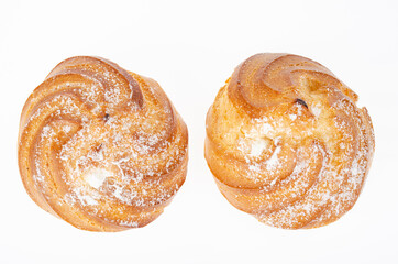 Fresh homemade cakes with cream and powdered sugar. Studio Photo