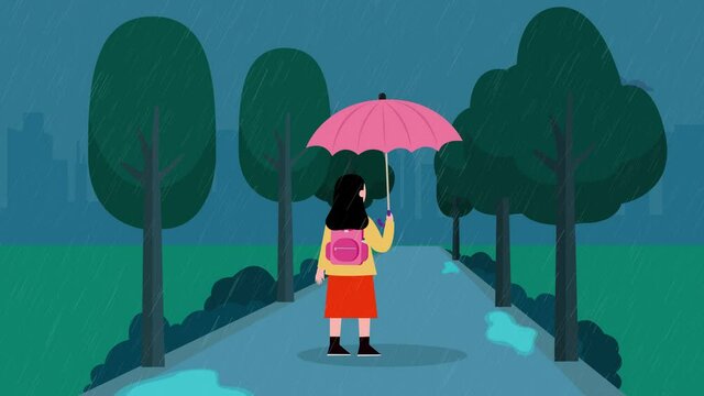 Schoolgirl walking in rainy day with umbrella