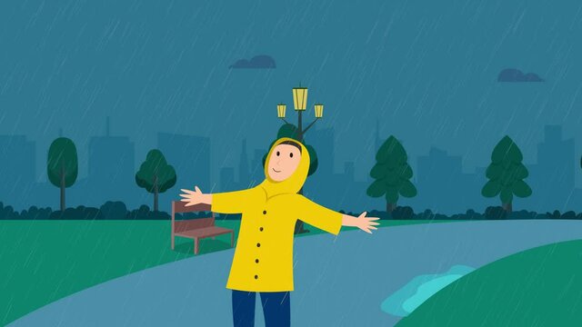 Young woman playing in rainy day with raincoat