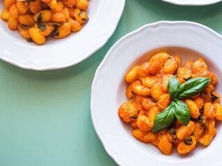 Italian potato gnocchi pasta with tomato sauce and mozzarella cheese