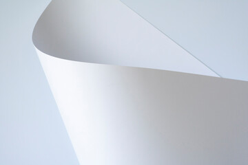 White paper sheet on a white background.