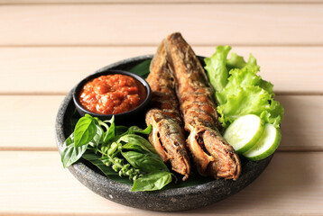 Lele Goreng or Fried Catfish is Traditional Indonesian Culinary Food. Catfish and Chilli Tomato Paste, Popular Street Food Called Pecel Lele Lamongan