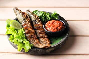 Lele Goreng or Fried Catfish is Traditional Indonesian Culinary Food. Catfish and Chilli Tomato Paste, Popular Street Food Called Pecel Lele Lamongan
