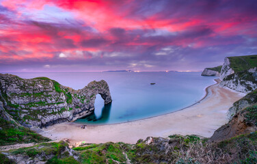 Durdle Door sunset panorama near Dorset. United Kingdom