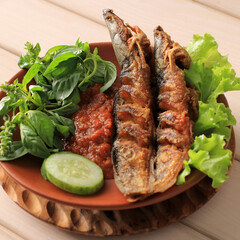 Lele Goreng or Fried Catfish is Traditional Indonesian Culinary Food. Catfish and Chilli Tomato Paste, Popular Street Food Called Pecel Lele Lamongan