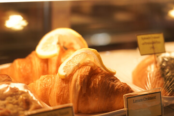 Fresh Baked Croissants in glass cabinet.    