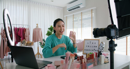 Asia woman micro influencer record live viral video camera at home studio. Happy youtuber fun talk speak advice review hobby in media. Vlogger selfie shoot enjoy work show smile teach like and share.