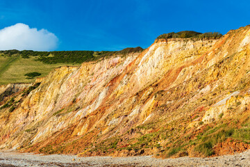 Coloured sands on the beach and cliffs at Worbarrow Bay