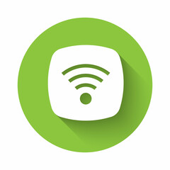 White Wi-Fi wireless internet network symbol icon isolated with long shadow. Green circle button. Vector