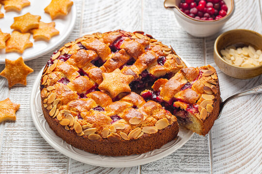 Linzer torte. Traditional Austrian cake with cranberries and almonds, lattice design on top, often eaten at Christmas. Homemade.