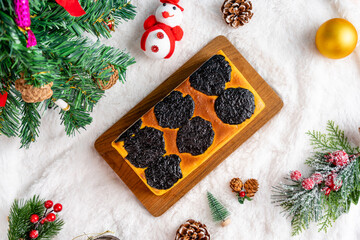 Lapis Legit or Thousand Layers Cake with prunes as topping and filling. 

Spekkoek or lapis legit...