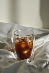 glass of iced coffee on white background