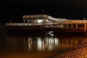 Fototapeta na wymiar ‘Alte Liebe’ (‘Old Love’), famous observation deck in Cuxhaven, Germany at the river Elbe at night