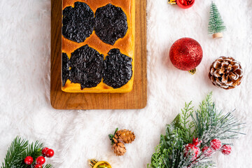 Lapis Legit or Thousand Layers Cake with prunes as topping and filling. 

Spekkoek or lapis legit is popular in Indonesia and is served as a holiday treat, especially for natal, imlek, and lebaran.
