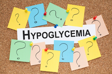 Hypoglycemia word concept on cork board