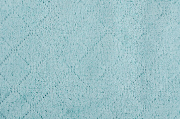The texture of a knitted sweater.