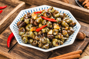 Chinese food: Stir fried snails with thirteen spices