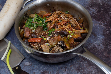 Korean vegan meal with carrot, eggplant, cabbage, pepper, raddish