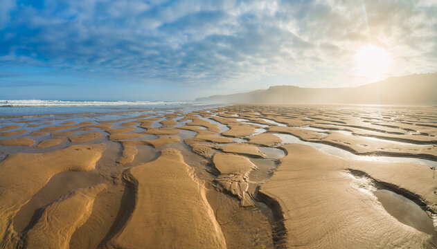 Watergate Beach at sunrise in Cornwall. UK
