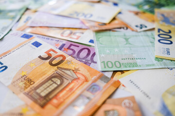 Various Euro banknotes as background image for financial issues.