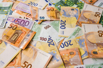 Various Euro banknotes as background image for financial issues.