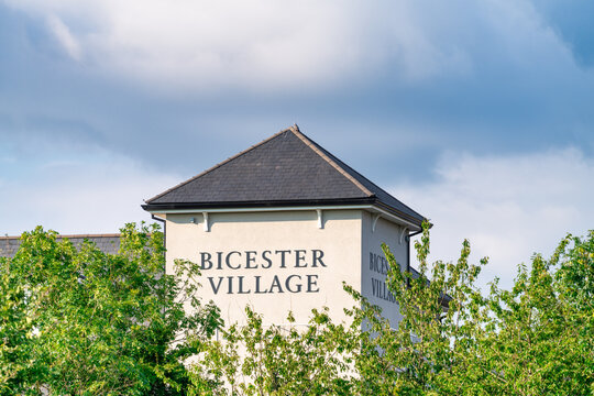 Bicester,England-August 2021: Bicester Village sign. Its popular shopping mall on the outskirts of Bicester town