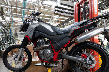 motorcycle factory, assembly line and conveyor
