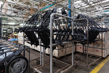 motorcycle frames before installation in a motorcycle factory