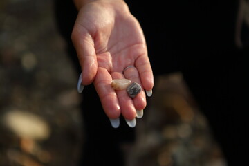 Handful of sea stones on the beach. Conceptual design
