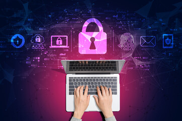 Internet network security concept with person using a laptop computer