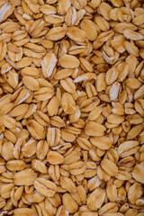 background of ripe oatmeal grains vertical photo
