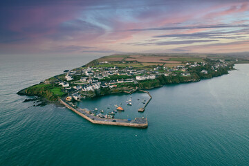 Aerial view of Ballycotton, a coastal fishing  village in County Cork, Ireland, at sunrise on a...
