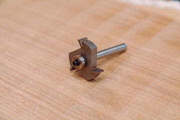 Steel router bit for milling cutter on a wooden table