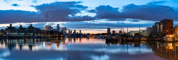 London skyline panorama of river Thames overlooking Canary Wharf at sunrise. England