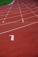 Red running track in sport stadium