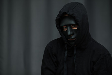 Fototapeta na wymiar hacker in mask,cybersecurity,network protection from hacking