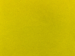 yellow velvet fabric texture used as background. Empty yellow fabric background of soft and smooth textile material. There is space for text...