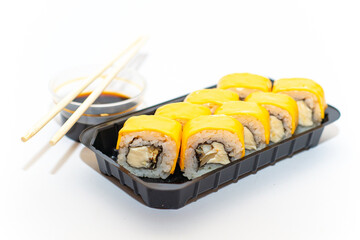 Philadelphia roll sushi with salmon, shrimps, avocado, cream cheese. Sushi menu. Japanese food