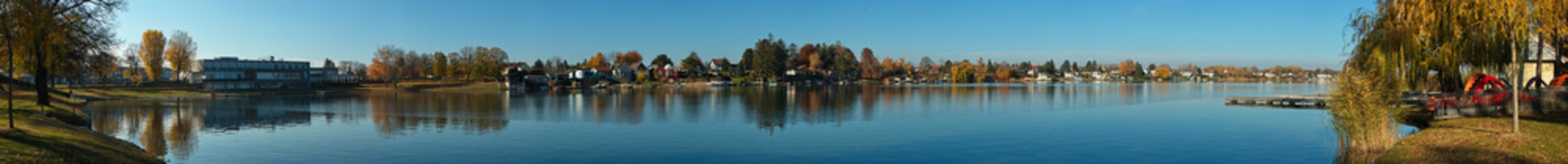 Fototapeta na wymiar Panoramic view of Neufelder Lake in Neufeld an der Leitha, Burgenland, Austria, Europe 