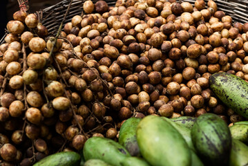Green mangoes and longans