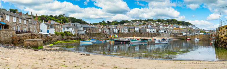 Fototapeta na wymiar Mousehole harbour panorama near Penzance in Cornwall. United Kingdom