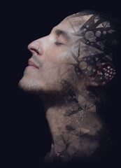 Paintography. Young man dissolving into his thoughts. Isolated on a black background