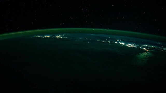 Spectacular earth night view from space time lapse, aurora borealis and sunrise with sun light power. Based on images furnished by Nasa