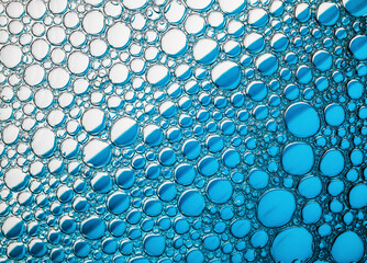 Blue bubbles macro texture. Foam bubbles background.