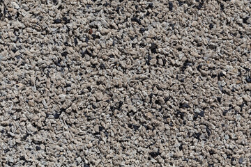 Crushed granite stones wall - close up
